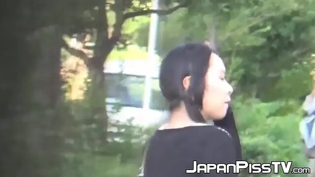 Naughty Japanese girls pee in public in lingerie