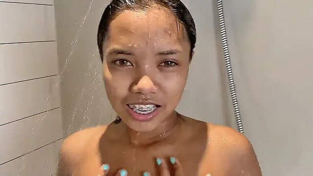 Teeny Oriental girl with braces spreads legs for foreign dong